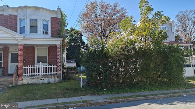 view of home's exterior featuring a porch