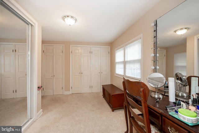 home office featuring light colored carpet