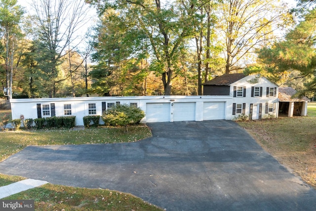 view of front of house with a garage