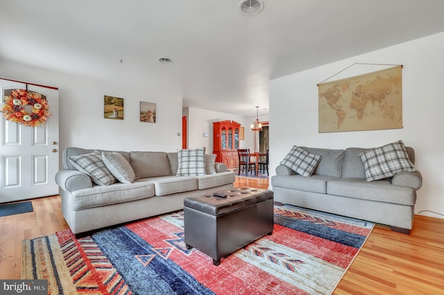 living room with hardwood / wood-style floors