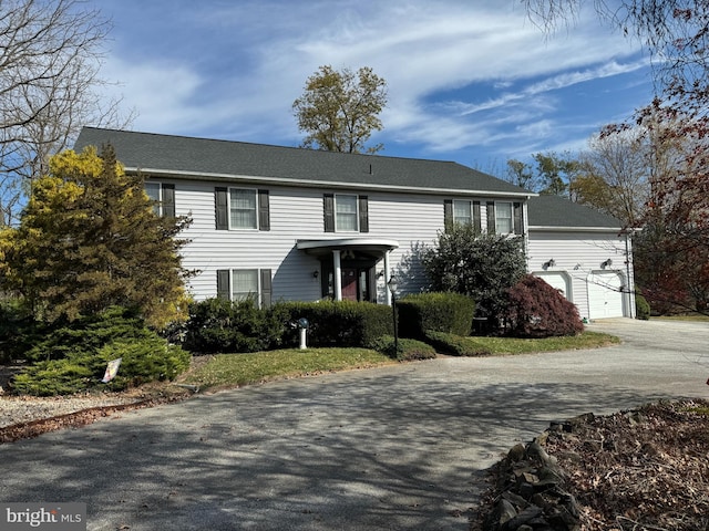 view of front of house with a garage