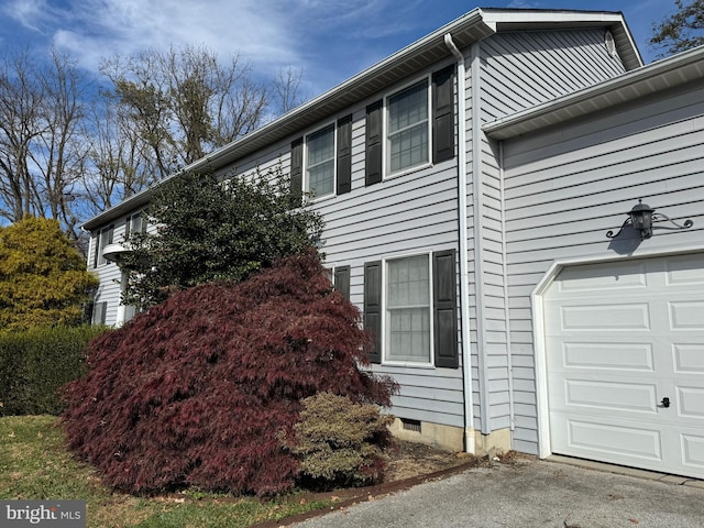 view of home's exterior with a garage