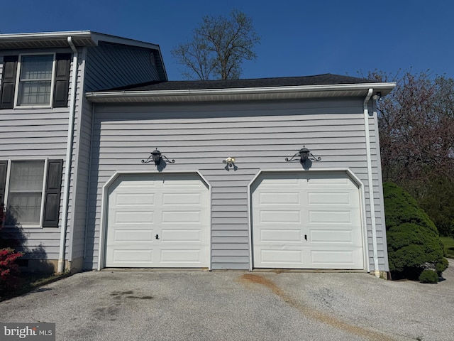 garage with driveway