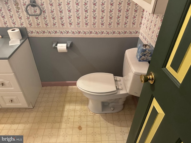 bathroom featuring toilet and tile patterned floors