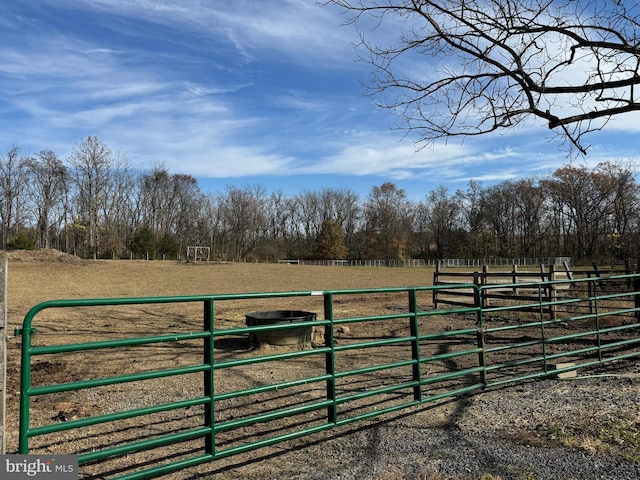 view of gate featuring a rural view