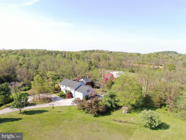 drone / aerial view with a forest view