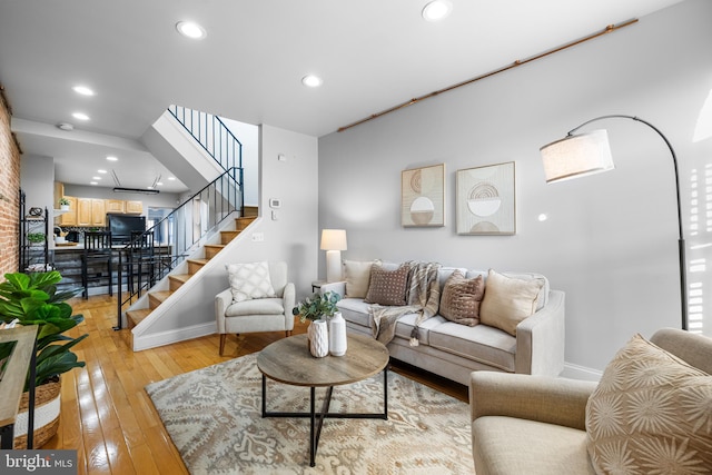 living room with light hardwood / wood-style flooring