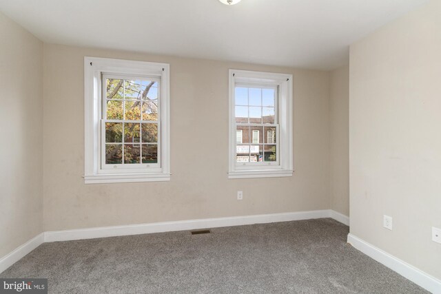 view of carpeted spare room