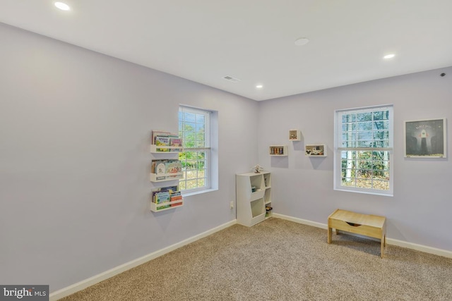 unfurnished room with carpet flooring