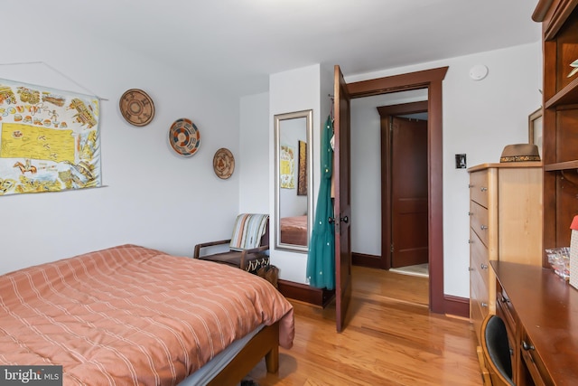 bedroom with light hardwood / wood-style flooring