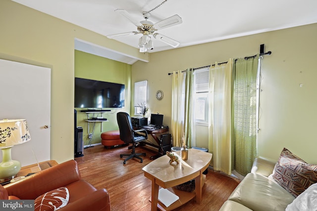 office space with hardwood / wood-style floors, ceiling fan, and vaulted ceiling