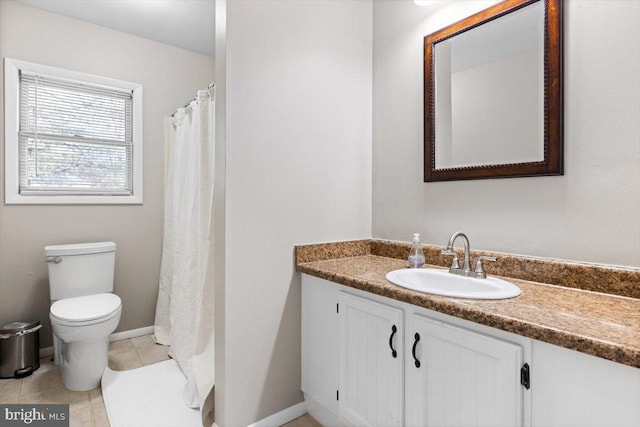 bathroom with tile patterned floors, vanity, toilet, and a shower with curtain