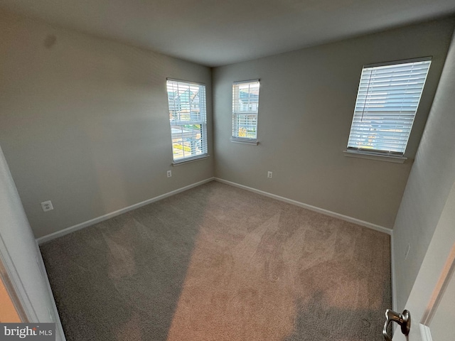 view of carpeted spare room