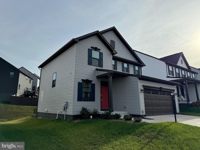 view of front facade with a front lawn and a garage