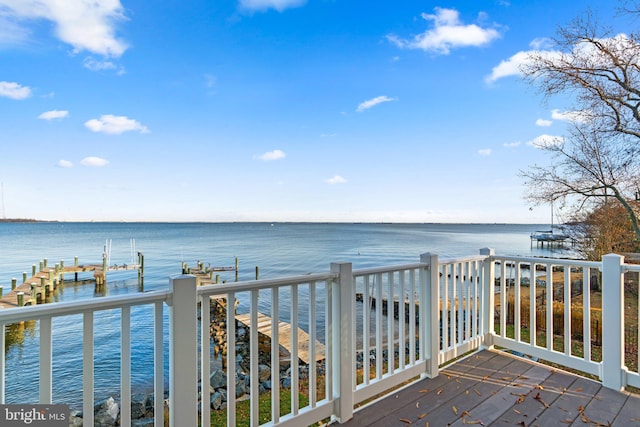 deck featuring a water view