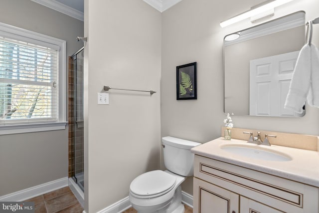 bathroom with crown molding, vanity, and walk in shower