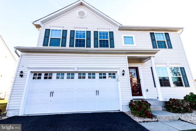 view of front of home with a garage