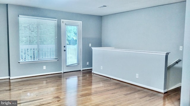 interior space with hardwood / wood-style floors