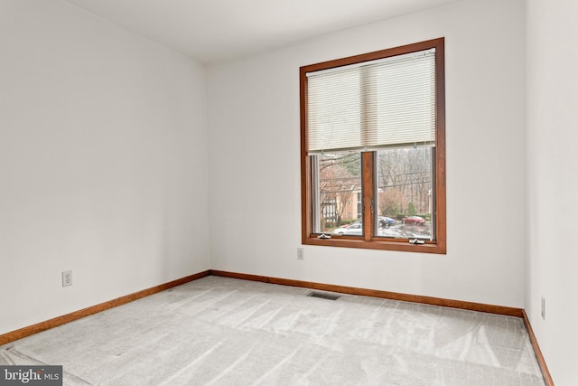 empty room featuring carpet floors