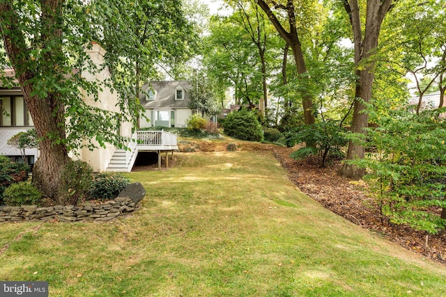 view of yard with a deck