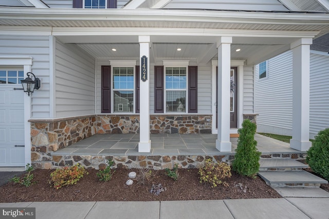 doorway to property with covered porch