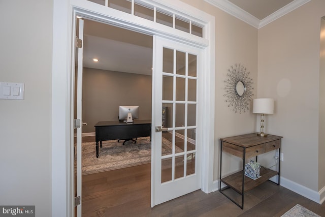 doorway with dark hardwood / wood-style flooring and crown molding