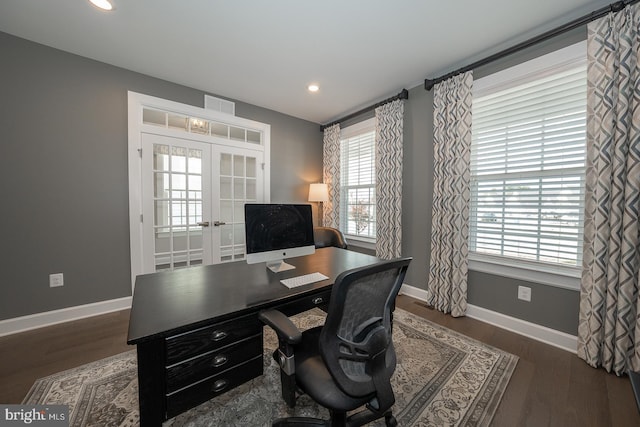 office area featuring dark hardwood / wood-style floors, a wealth of natural light, and french doors