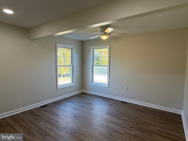 unfurnished room with ceiling fan and dark hardwood / wood-style floors