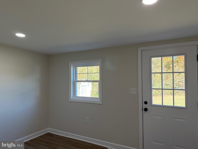 doorway featuring dark hardwood / wood-style flooring