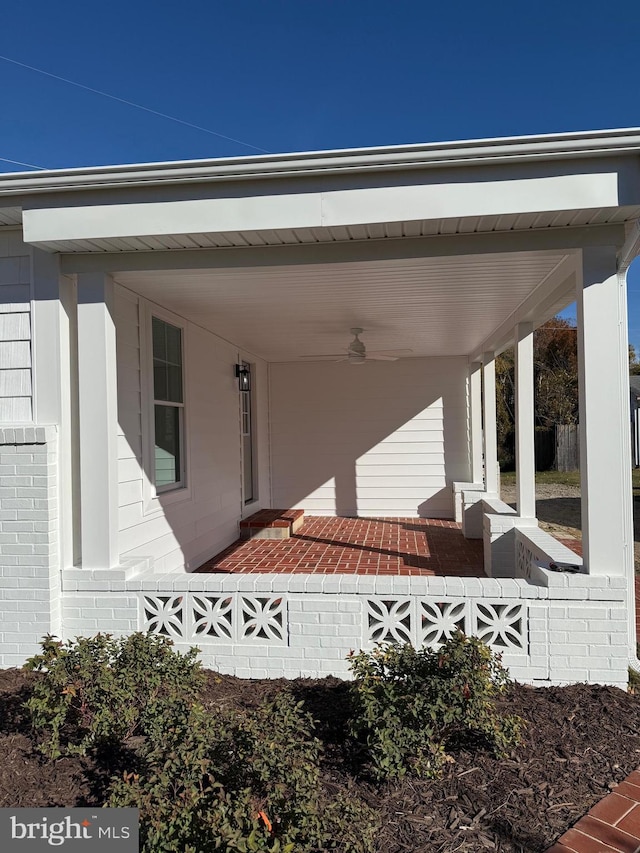 view of patio / terrace with a porch and ceiling fan