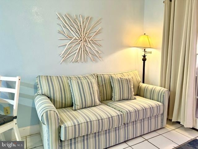 sitting room with light tile patterned floors