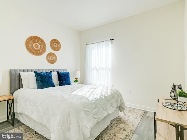 bedroom featuring hardwood / wood-style floors