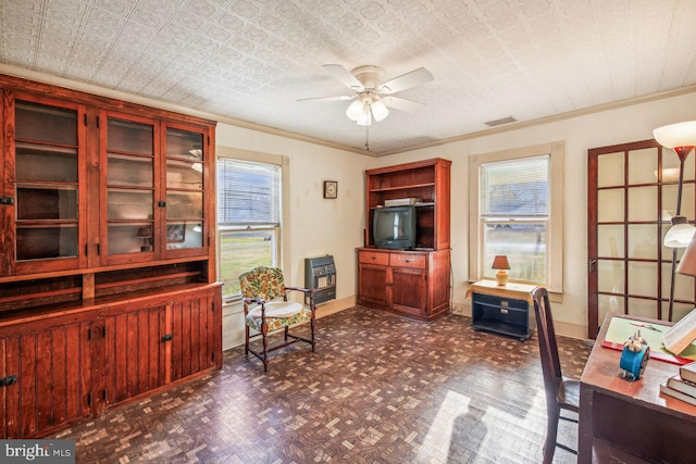 office with a textured ceiling, ceiling fan, crown molding, and dark parquet floors