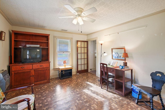 office space with a textured ceiling, ceiling fan, crown molding, and dark hardwood / wood-style floors