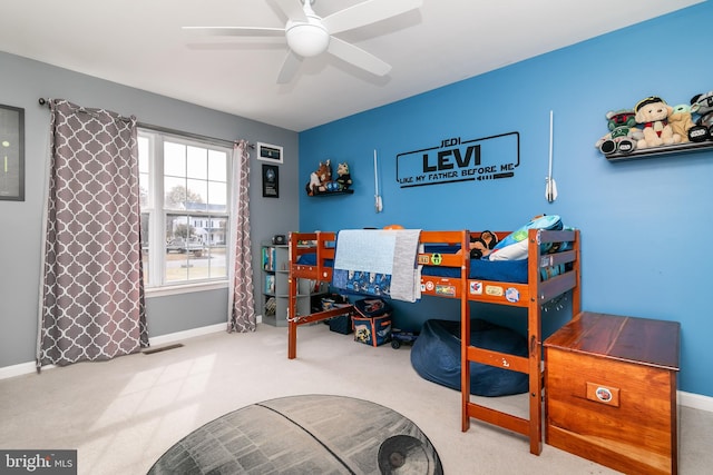 carpeted bedroom with ceiling fan