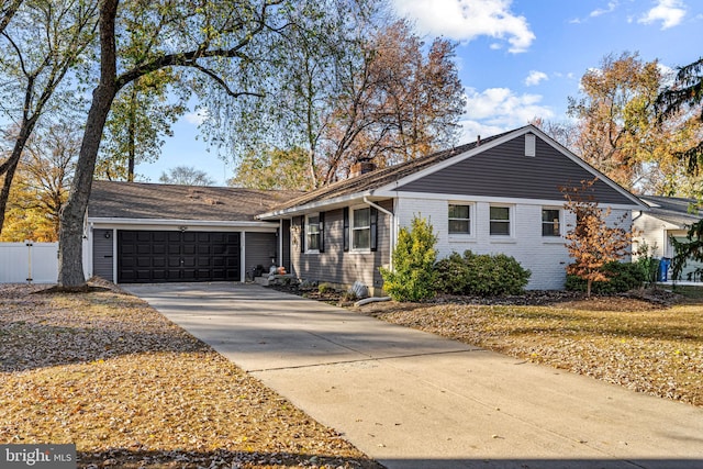 single story home featuring a garage