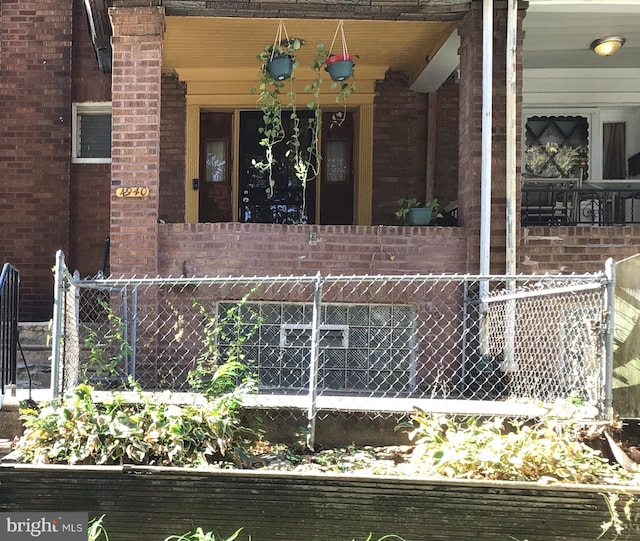 entrance to property with covered porch