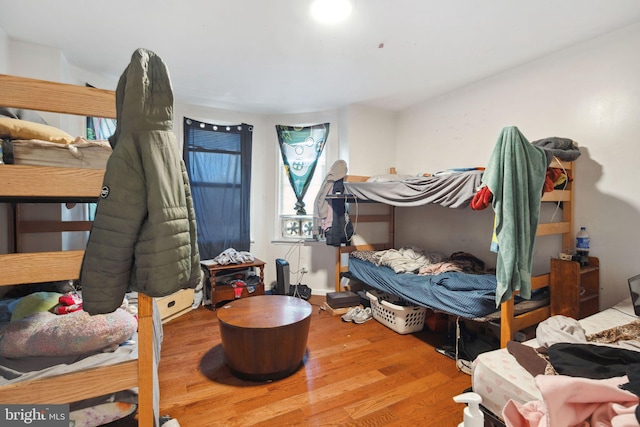 bedroom featuring hardwood / wood-style floors