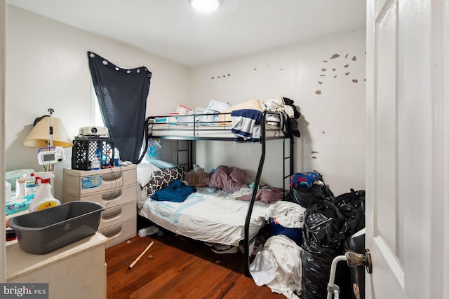 bedroom featuring dark wood-type flooring