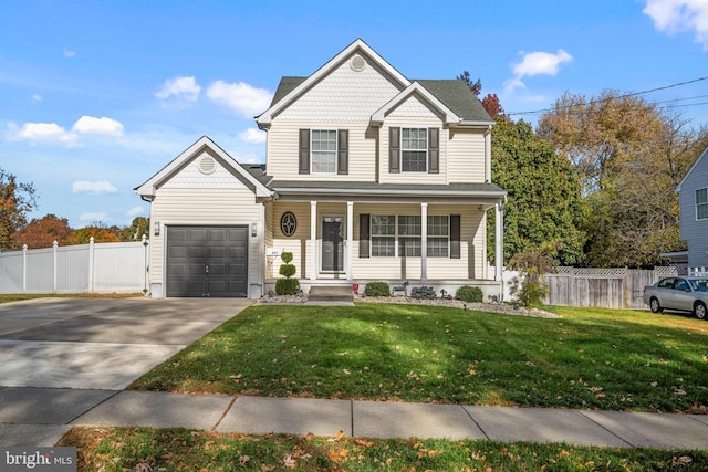 front of property featuring covered porch, a front yard, and a garage