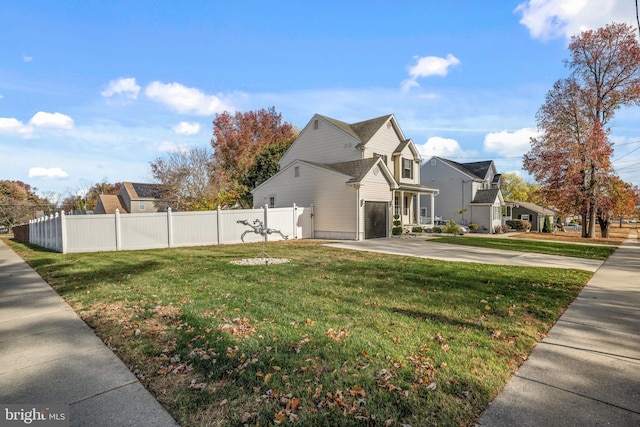 view of home's exterior featuring a yard and a garage