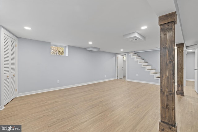 basement featuring light wood-type flooring