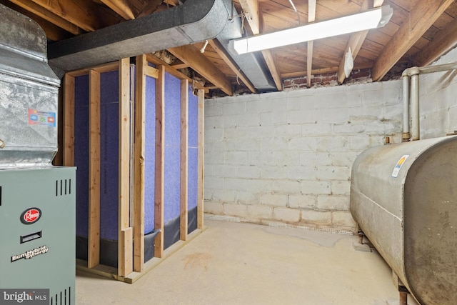 basement featuring heating unit