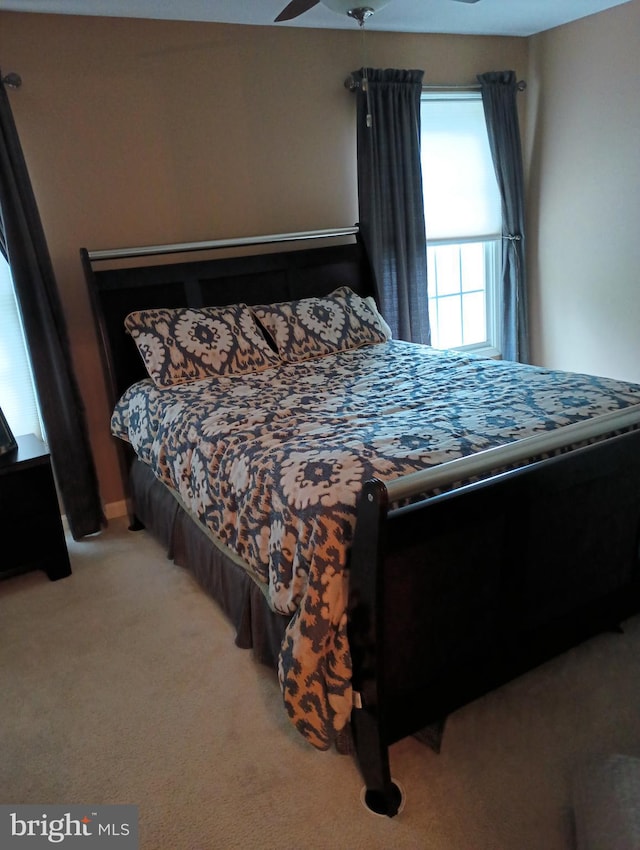 bedroom featuring carpet flooring and ceiling fan