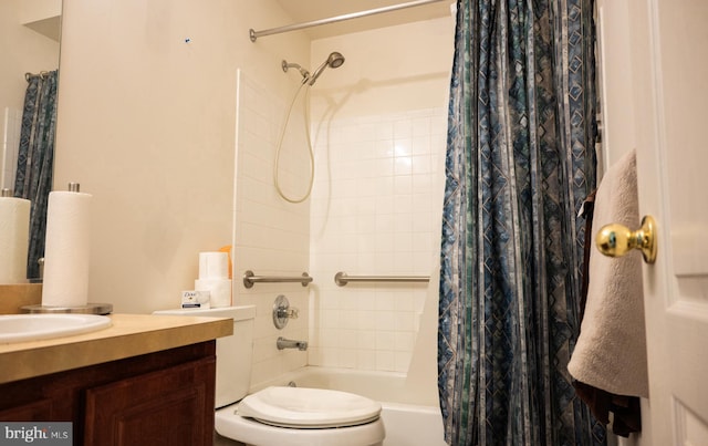 full bathroom featuring shower / tub combo with curtain, vanity, and toilet