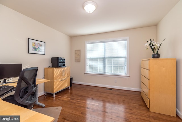 office area with dark hardwood / wood-style flooring