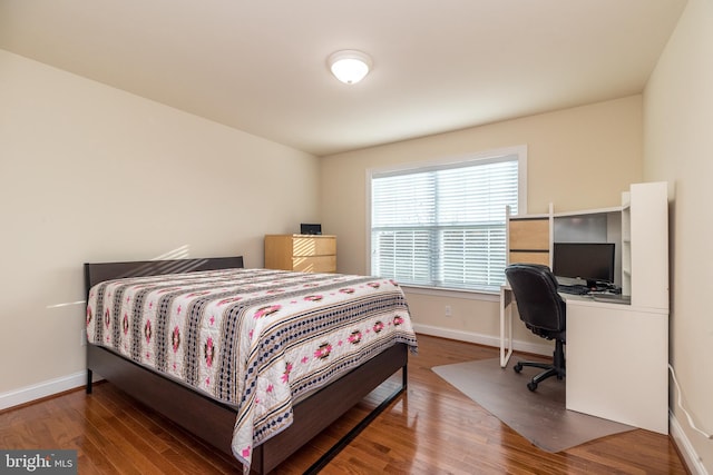 bedroom featuring wood-type flooring