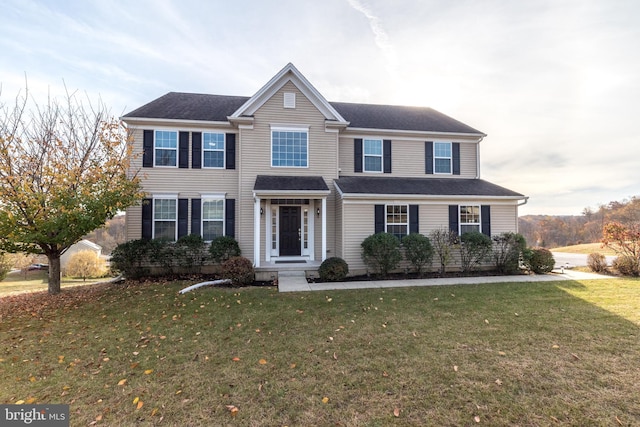 view of front facade with a front lawn