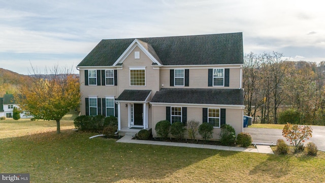 view of front of home with a front yard