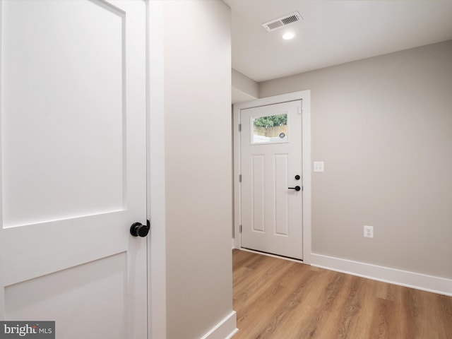 foyer entrance featuring light hardwood / wood-style flooring